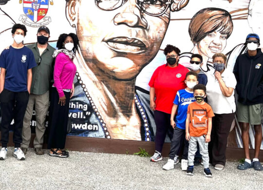 UBE Youth Group Photo in front of Artemisia Bowden mural